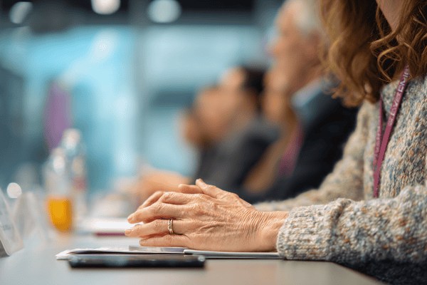 Business people talking around a conference table