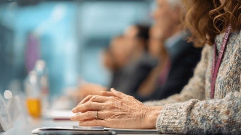 Business people talking around a conference table