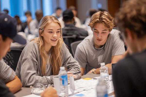 College students talking at a table