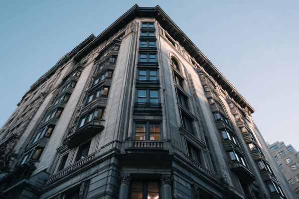 Looking up at a downtown apartment building 