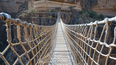 Rope bridge spanning a deep canyon