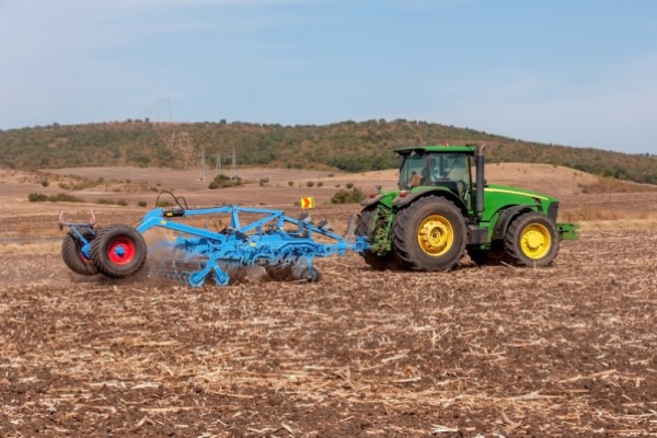 Agricultural machine in tilled field