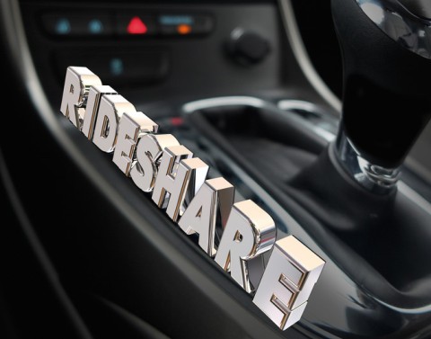 Letters forming the word RIDESHARE are placed on the driver´s side of the gear shift case