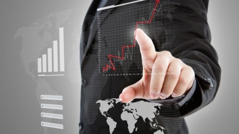 Businessman touching graph