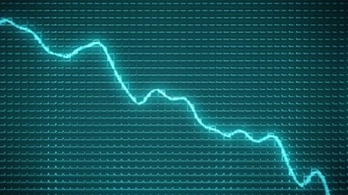 Blue graph on dark background with bright blue arrow plunging downward on trendline
