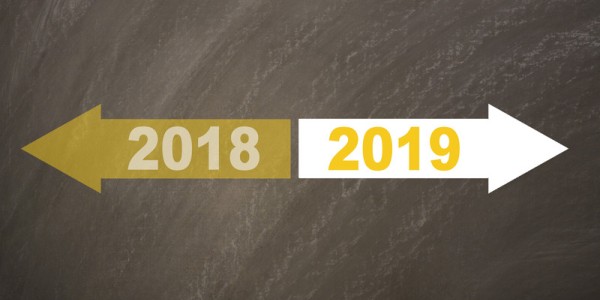 A yellow arrow with the year 2018 is pointing to the left and a white arrow with the year 2019 is pointing to the right