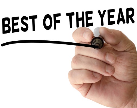 Hand underlining the words BEST OF THE YEAR in black sharpie marker on a white background