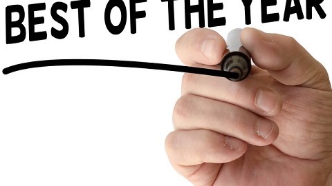 Hand underlining the words BEST OF THE YEAR in black sharpie marker on a white background