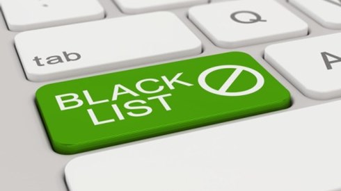 A keyboard CapsLock key is green and replaced by the words BLACK LIST and the prohibited symbol