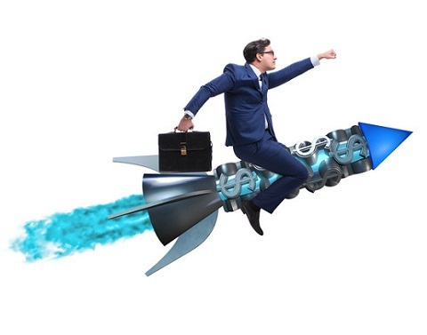 Businessman on Dollar Sign Rocket