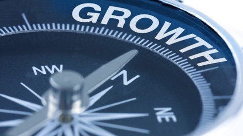Compass pointing in direction of GROWTH