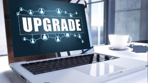 Laptop with Upgrade showing on screen