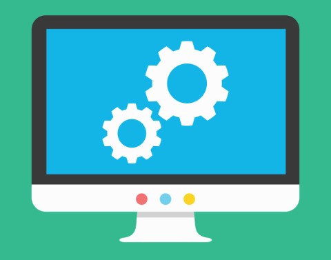 Computer monitor with a large and a small gear or settings icons