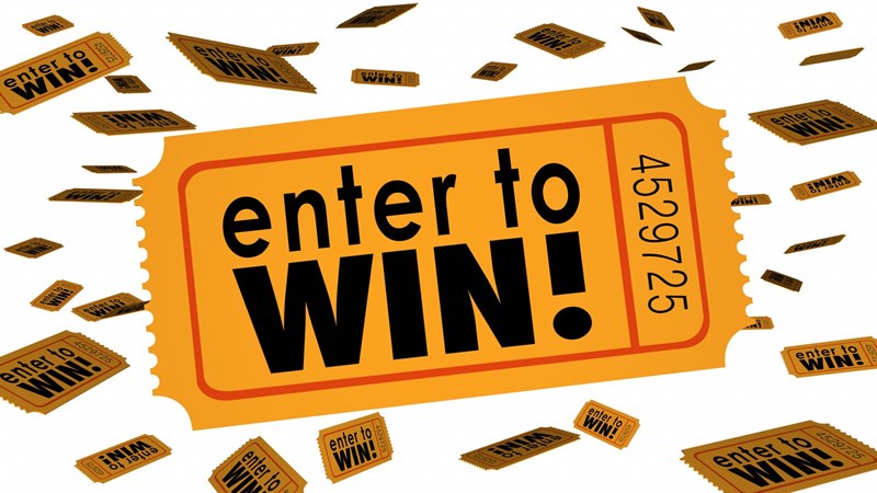One large ticket reading "Enter to Win" on a background of many smaller falling tickets.