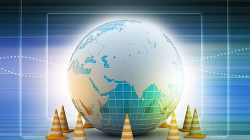 Globe with construction cones surrounding it