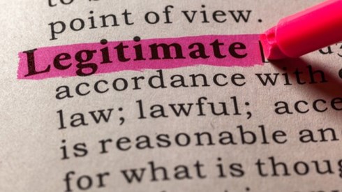 The word Legitimate is highlighted in pink and defined in a dictionary