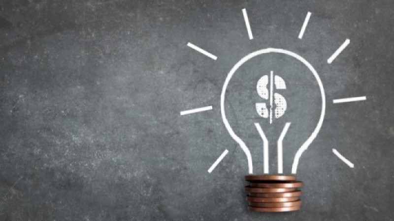 Money Light Bulb On Chalkboard