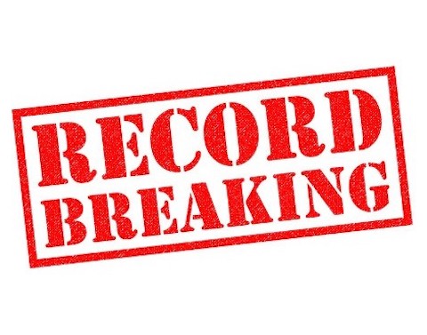RECORD BREAKING in red letters in a red rectangle