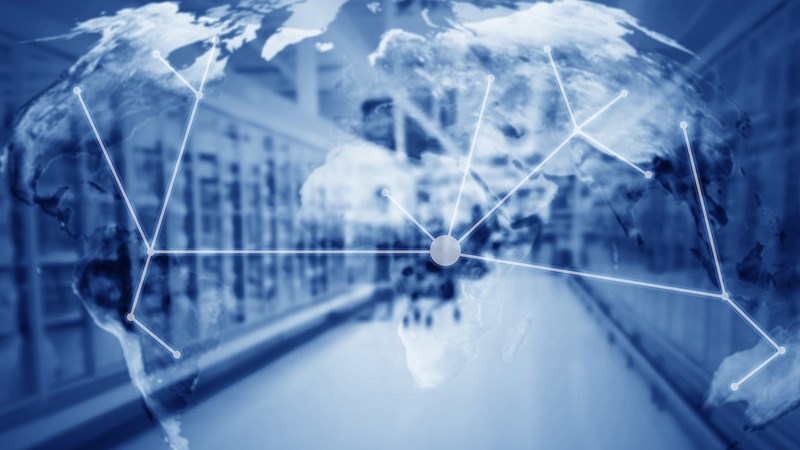 Supply Chain Mapped Out with Pinpoint Dots Connected by Lines on Globe and Warehouse