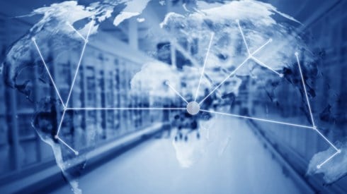 Supply Chain Mapped Out with Pinpoint Dots Connected by Lines on Globe and Warehouse