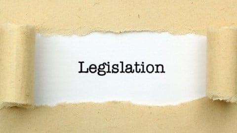 Torn Paper Exposing The Word Legislation