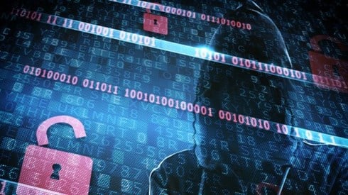 Person in a hoodie with computer code and red locks covering the image