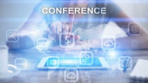 Woman selecting online conference on a tablet virtual screen