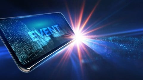 The word event on a cellphone screen with starburst and stars in blue background