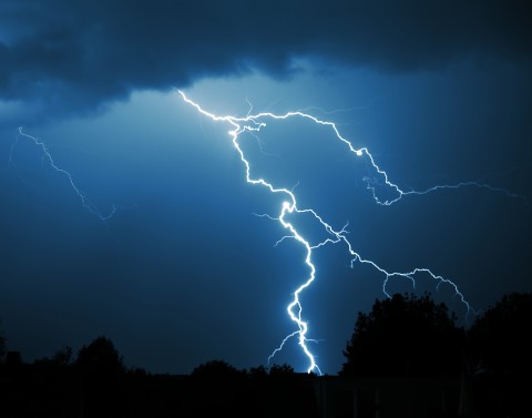 Lightning strike in dark sky