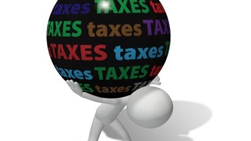Black Ball With Taxes Text On Cartoon Figure