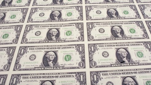 An uncut printed sheet of one dollar bills