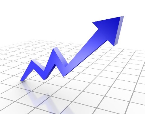 Blue arrow rising over grid to show increase