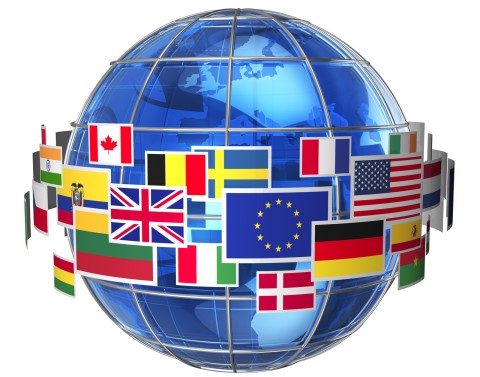 Blue globe with wire cage around it and flags of countries hovering around the middle of the globe