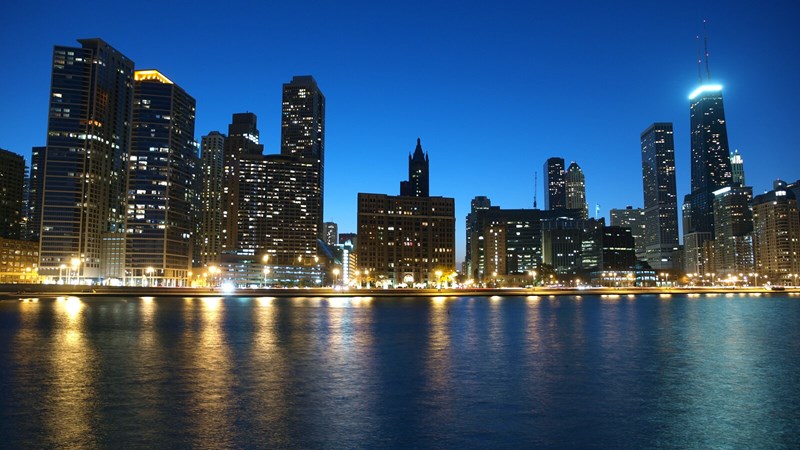 Chicago skyline at night as seen from Michigan Lake