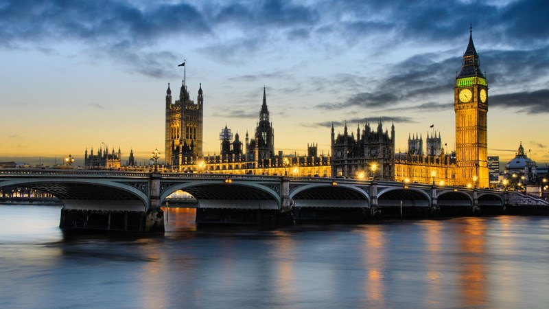 Big Ben and Wesminster Abbey at sunset in London