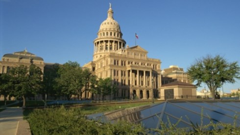 A view of the courtyard and the Texas Capitol Building in Austin
