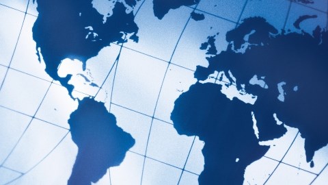 Goode world map in blue at a diagonal angle