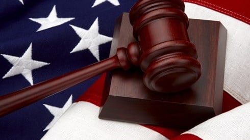 Gavel and base lying on the American flag