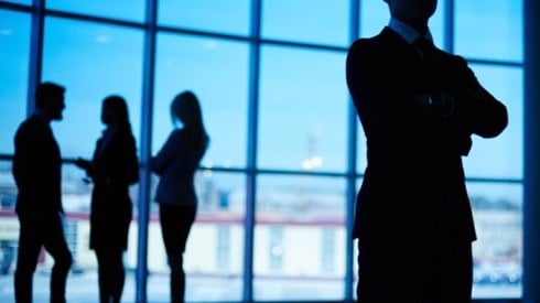 Business Leader In Front Of Window