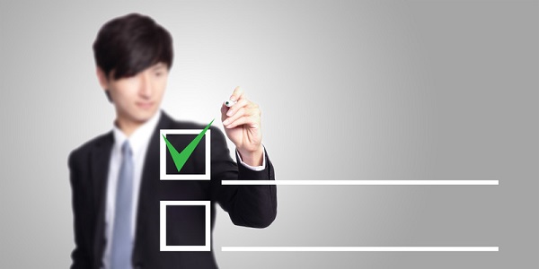 Businessman checking check box