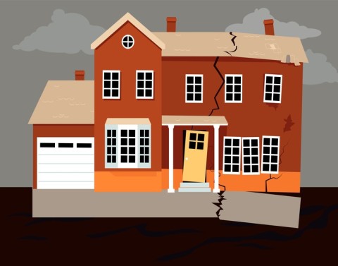 Land problems cause a foundation to partially separate from a home and create a crack from base to roof and a smaller crack