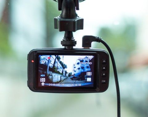 Dash cam installed in an auto filming the street ahead