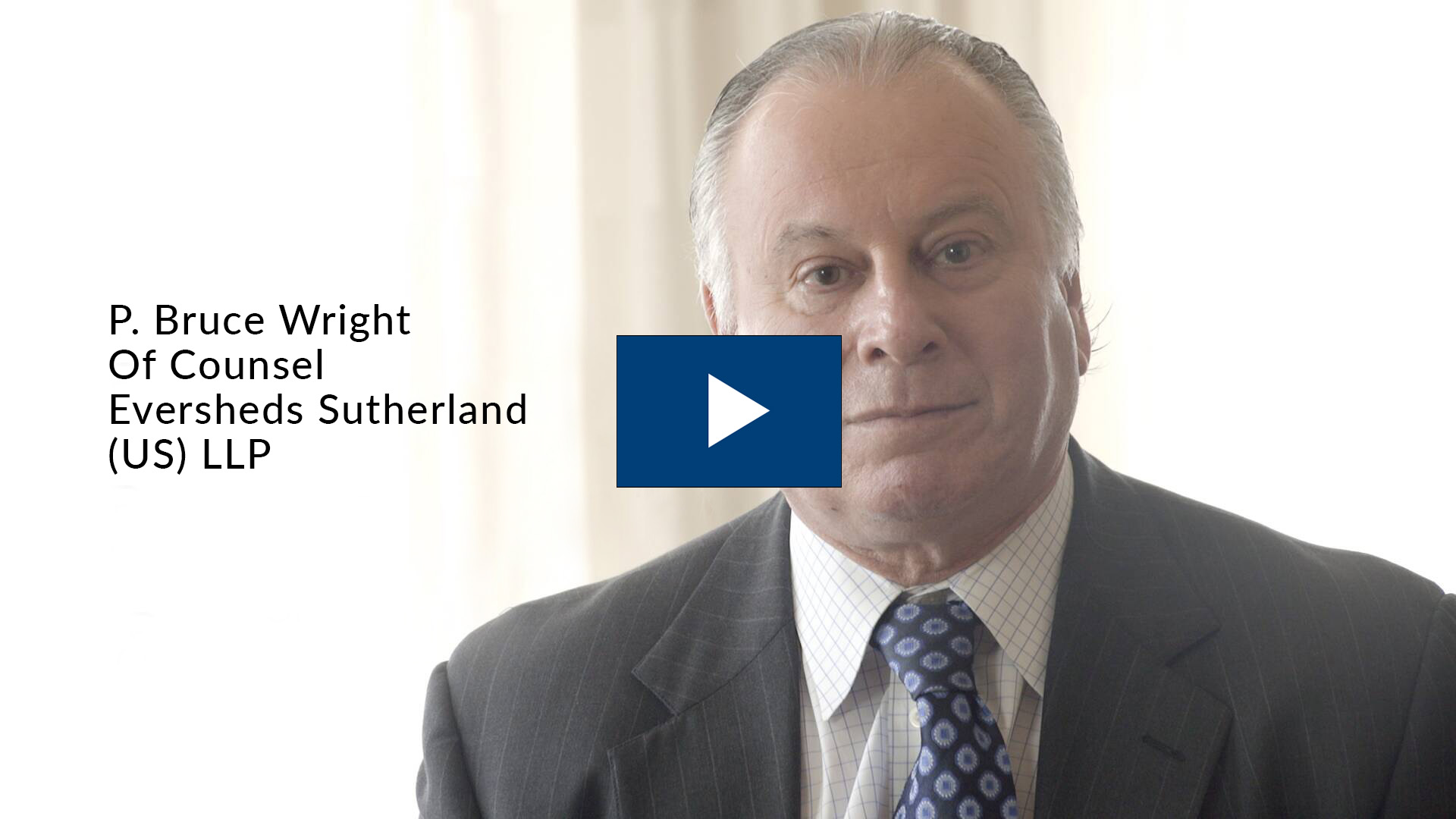 Headshot of Bruce Wright with a blue play button on top.