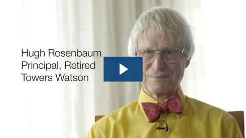 Headshot of Hugh Rosenbaum with a blue play button on top.