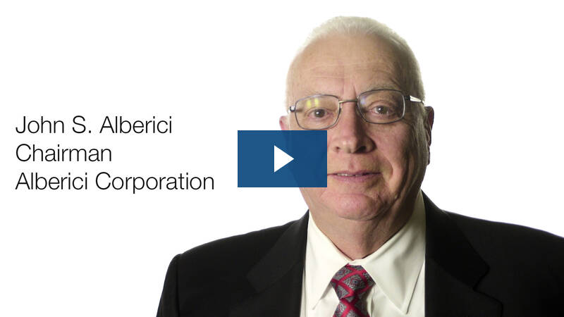 Headshot of John Alberici with a blue play button on top.