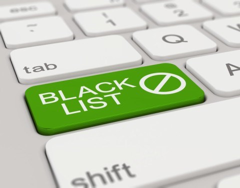 A keyboard CapsLock key is green and replaced by the words BLACK LIST and the prohibited symbol