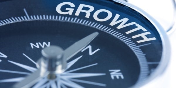 Compass pointing in direction of GROWTH
