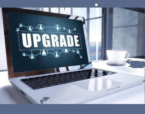 Laptop with Upgrade showing on screen
