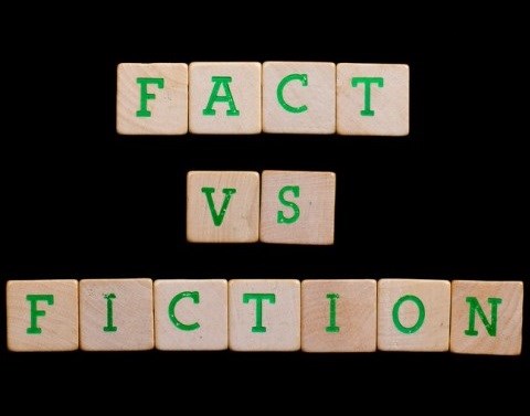 Fact versus Fiction written with scrabble tiles