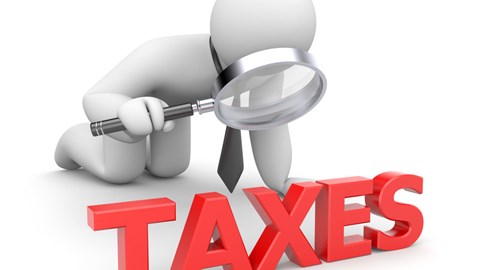 A 3D bubble businessman icon uses a magnifying glass to examine red letters forming the word TAXES